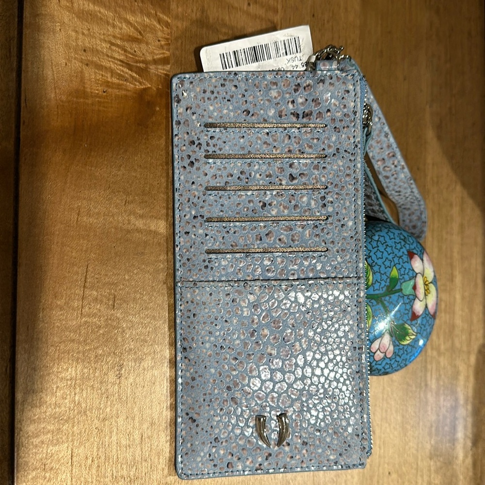New Leather TUSK Wristlet.